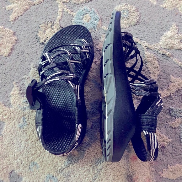 white and black chacos